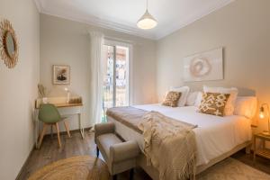 Ліжко або ліжка в номері 13PAR1004 - Fabulous apartment in the heart of Barcelona