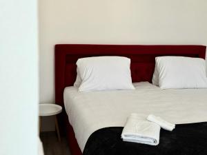 Postel nebo postele na pokoji v ubytování Sky Apartments 501