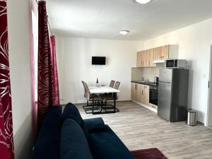 Kuchyň nebo kuchyňský kout v ubytování Sky Apartments 501