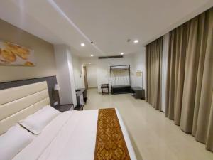 Krevet ili kreveti u jedinici u okviru objekta Wave View Hotel
