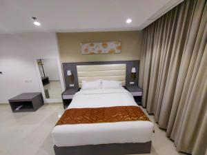 Krevet ili kreveti u jedinici u okviru objekta Wave View Hotel