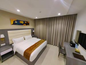 Krevet ili kreveti u jedinici u okviru objekta Wave View Hotel