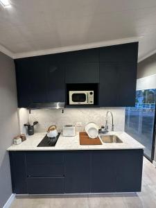A cozinha ou cozinha compacta de Cabaña Vinson Cabra Corral