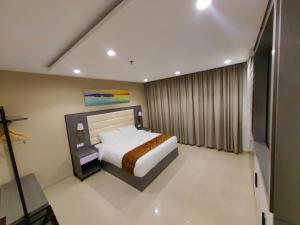 Krevet ili kreveti u jedinici u okviru objekta Wave View Hotel