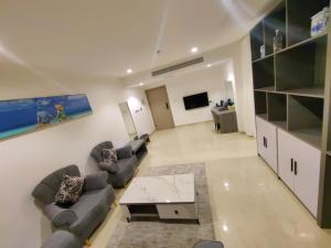 TV i/ili multimedijalni sistem u objektu Wave View Hotel