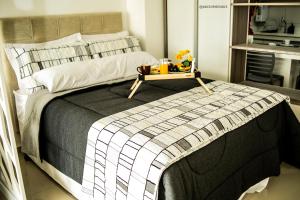 Ένα ή περισσότερα κρεβάτια σε δωμάτιο στο Flat Beira Mar Recife - Praia de Piedade +24 φωτογραφίες