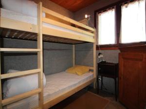 a bedroom with two bunk beds and a desk at Chalet Peisey-Nancroix-Plan Peisey, 6 pièces, 11 personnes - FR-1-757-78 in Peisey-Nancroix