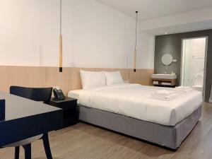 Postel nebo postele na pokoji v ubytování Grandview Residence + 37 fotografií