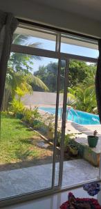 Bazén v ubytování Villa Jungle Paradise nebo v jeho okolí