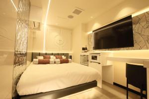 Postel nebo postele na pokoji v ubytování Hotel Blanche 大人専用 Adult only hotel