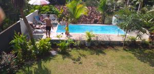 Bazén v ubytování Villa Jungle Paradise nebo v jeho okolí