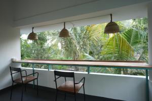 Ein Balkon oder eine Terrasse in der Unterkunft Cliff & Coral