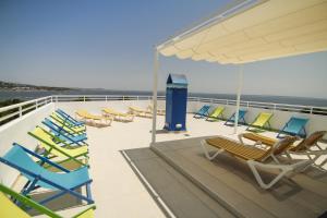 a group of chairs on the deck of a cruise ship at Hostel Floridita Adults Only in Magaluf