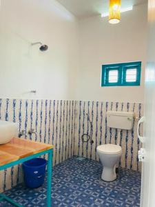 Ein Badezimmer in der Unterkunft Cliff & Coral