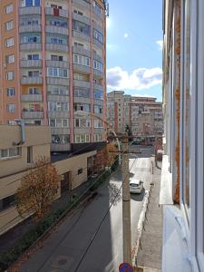 a view of a city street with a building at Ame Farmec in Cluj-Napoca