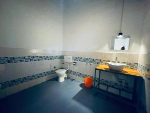 Ein Badezimmer in der Unterkunft Cliff & Coral