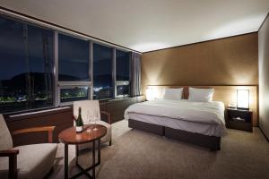 Letto o letti in una camera di Hotel Interciti