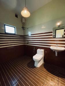 Ein Badezimmer in der Unterkunft Cliff & Coral