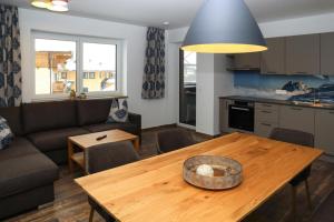 A kitchen or kitchenette at Apartment in Bramberg am Wildkogel with barbecue Még 37 kép