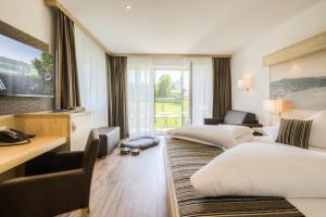 Voodi või voodid majutusasutuse Seehotel Das JO toas