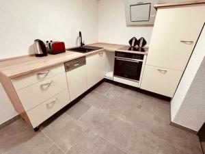 Dapur atau dapur kecil di Gemütliche Wohnung in Leverkusen