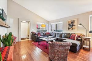 a living room with a couch and a table at Park Forest Estates in Breckenridge