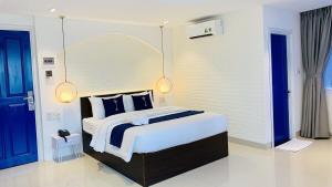 Postel nebo postele na pokoji v ubytování Lucia Beach Hotel