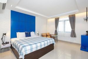 Postel nebo postele na pokoji v ubytování Lucia Beach Hotel