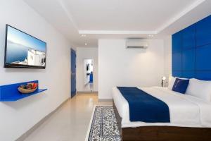 Postel nebo postele na pokoji v ubytování Lucia Beach Hotel
