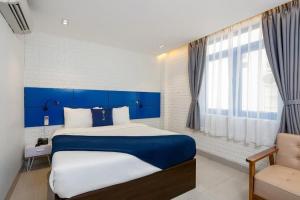 Postel nebo postele na pokoji v ubytování Lucia Beach Hotel