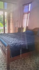 Postel nebo postele na pokoji v ubytování Mountain Thai Style Chalet