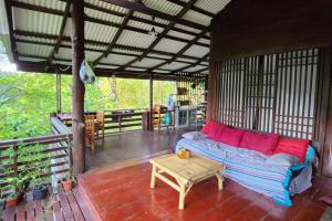 Balkón nebo terasa v ubytování Mountain Thai Style Chalet