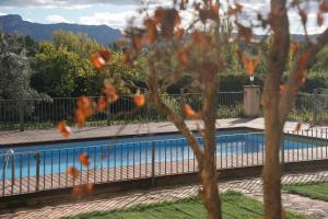 Bazén v ubytovaní Hotel Hort De Fortunyo alebo v jeho blízkosti