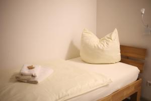 Postel nebo postele na pokoji v ubytování Hotel Duwakschopp