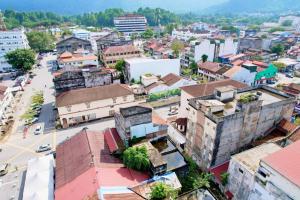 an aerial view of a city with buildings at Barrack Street Hotel in Taiping