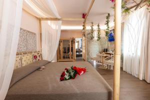 A bed or beds in a room at Suite Dreams Montecatini