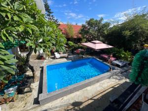 Bazén v ubytování Serendipity Experience Hoi An Hostel nebo v jeho okolí