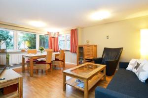 Posezení v ubytování Haus Bene- Vivere Bungalow + 15 fotografií