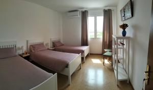 Postel nebo postele na pokoji v ubytování Agriturismo Le Crede 1930