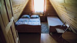 Katil atau katil-katil dalam bilik di Domki Bieszczadnik