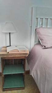 Postel nebo postele na pokoji v ubytování Agriturismo Le Crede 1930