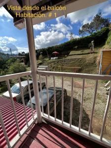 a car is laying on a porch at EL PARAISO G - FINCA HOTEL LGBT - ADULTS ONLY in San Vicente