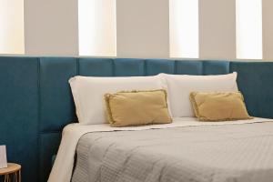 Letto o letti in una camera di U259 B&b