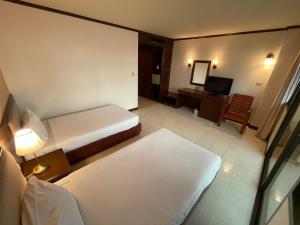 Cama o camas de una habitación en Bauman Ville Hotel