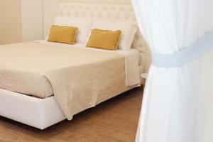 Letto o letti in una camera di U259 B&b