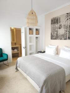 Postel nebo postele na pokoji v ubytování Riad Coconut
