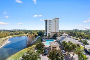 an aerial view of a resort with a pool and a building at Lost Key A505 in Perdido Key