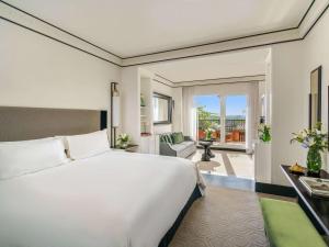 Katil atau katil-katil dalam bilik di Sofitel Marrakech Palais Impérial & Spa