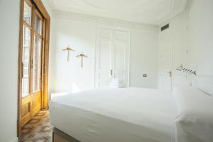 A bed or beds in a room at yök Casa Cultura