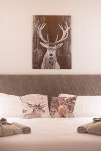 Postel nebo postele na pokoji v ubytování Hotel Villa Melì